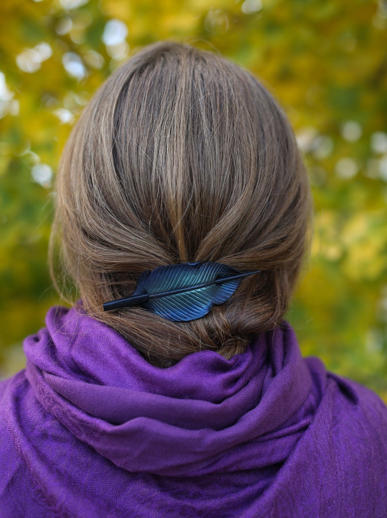 Raven feather ponytail holder with wood stick. Small tooled leather shawl pin in black w/ iridescent blues and greens. Gift for corvid lover image 2