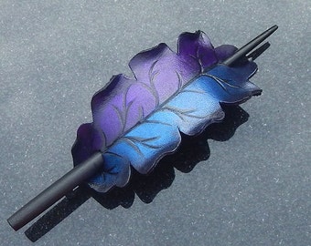 Fantasy leaf leather hair slide in black with shimmering indigo and violet. Oak leaf hair stick barrette in dream colors.