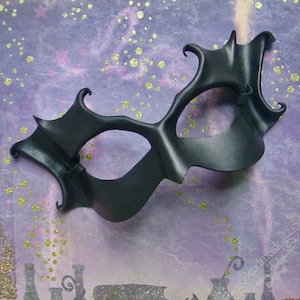 Handcrafted black leather mask for cosplay, LARP, Halloween. Wicked witch, dark fairy, gothic costume accessory for unisex adult.