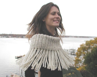 Fringed Shruggle. This versatile knit can be a wrap, shrug, shawl, scarf, infinity scarf, or cowl.   PDF knitting pattern