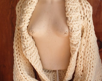 Chunky knit shrug in creamy white fits most medium - large women and also fits small women as an oversize cardigan