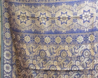 Vintage embroidered fabric panel  2 yards long paisley and stylized floral design with borders; beige and silvery white on blue background