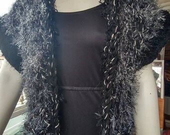 Chunky knit jacket in black and white with textured accents and short sleeves fits most large and extra large and some plus women