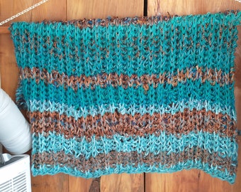 Bed cover accent chunky knit turquoise and coppery brown stripes for extra warmth on single bed or for ones partner in a queen or double bed