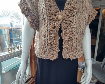 Chunky knit jacket in cream and beige with short wide sleeves, buttoned front and high textured edge accents fits most large and XL women