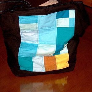 Padrão de bolsa frontal de colcha