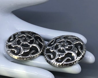 Taxco Sterling Silver Domed Repousse Clip Earrings Floral Design