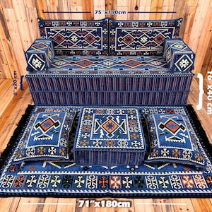 May include: A blue upholstered sofa set with a geometric pattern, including a sofa (75 inches x 190 cm), two armrests, two ottomans, and a rug (71 inches x 180 cm). The set features a striped base and fringed edges. The armrests are 8 inches x 20 cm and the cushions are 16 inches x 40 cm.