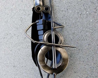 Moi. Ornement de sculpture en métal pour violoncelliste Hopper