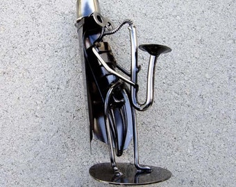 Stationnaire sculpture en métal M. Hopper le joueur de saxophone