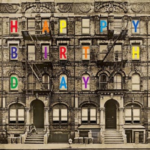 May include: A sepia-toned image of a brick apartment building with the words "HAPPY BIRTHDAY" in colourful letters in the windows. The building features fire escapes and a person sitting on the steps.