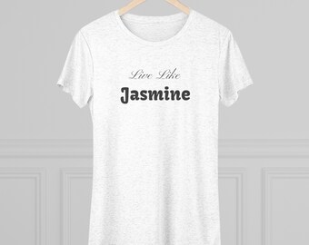 May include: White t-shirt with the text "Live Like Jasmine" printed on the front in black.