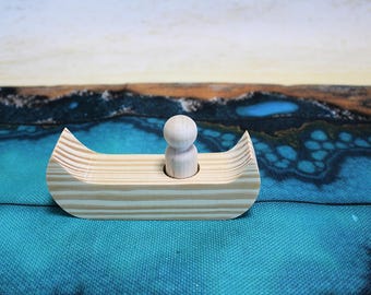 The Lone Traveler Canoe:  Unfinished Pine Canoe with Peg Doll
