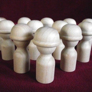 12 of the No. 11 Hard Hat Guy/Helmet Head Peg Dolls, Unfinished Hardwood