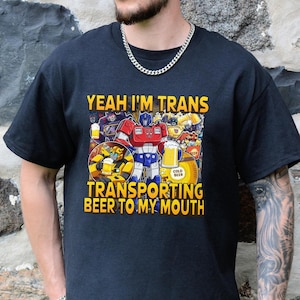 Trans Transformers Transporting This Beer To My Mouth Unisex Tee, Drinking Alcohol Party Shirt, Pride Joke Graphic Tee, Funny Beer Design