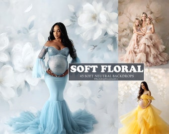 May include: Three women wearing tulle dresses pose in front of a soft floral backdrop. The backdrop features a white floral design on a light blue background. The text "SOFT FLORAL 45 SOFT NEUTRAL BACKDROPS @BackdropDreamlandCo" is displayed in the center of the image.