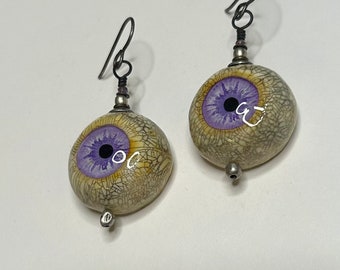 Purple Rain Zombie Head Eyeball Earrings