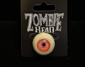 Small Pink Eyeball Zombie Head Lapel Pin