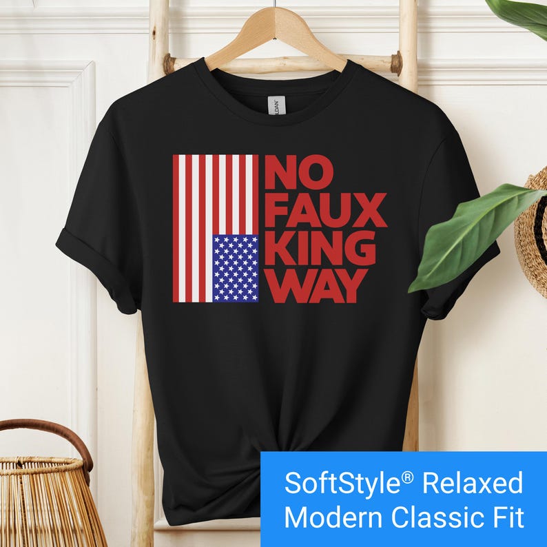 Black t-shirt with an inverted "in distress" American flag hanging vertically next to large text reading "No Faux King Way."