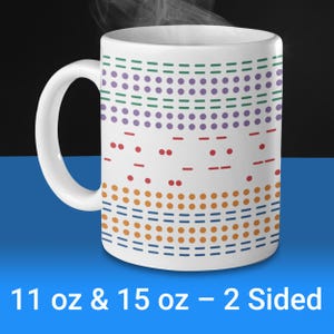 May include: White ceramic mug with a colorful geometric pattern. The pattern features rows of dots and lines in shades of green, purple, red, orange, and blue. The mug is available in 11 oz and 15 oz sizes and is two-sided.