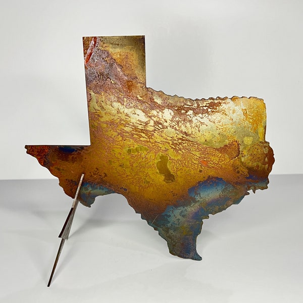 7 inch Texas table top sculpture.  Laser cut, flame treated for color and clear coated for longevity.