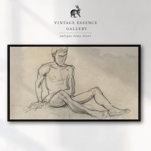 May include: A framed pencil sketch of a seated figure. The artwork is a detailed study of the human form, with visible shading and line work. The frame is black, and the text "VINTAGE ESSENCE GALLERY antique home decor" is at the top.