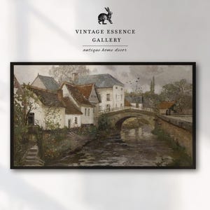 May include: A vintage painting depicting a quaint village scene with white houses clustered around a bridge over a river. The houses have brown roofs and are surrounded by lush greenery. The sky is overcast and the water is calm and reflective.
