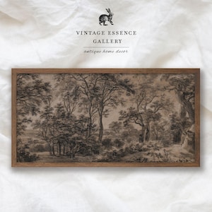 May include: A framed black and white drawing of a woodland scene. The drawing is in a simple wooden frame. The text "Vintage Essence Gallery" and "antique home decor" is printed below the image.
