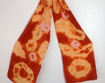 hand dyed silk scarf in orange tie dye