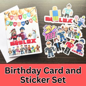 May include: A birthday card and sticker set featuring Roblox characters. The card has a "Happy Birthday" banner and Roblox logo. Stickers include various Roblox figures and the word "YEET".