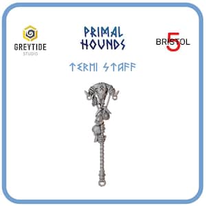 May include: A silver-coloured Termi Staff, a fantasy item, with a skull and bone design. The staff has a detailed, textured handle and is adorned with skulls and other decorative elements. The image also includes the text "Primal Hounds" and "Termi Staff".