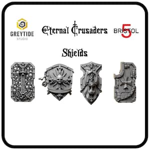 Könnte beinhalten: Vier verschiedene Schilddesigns für Miniaturen-Kriegespiele. Die Schilde zeigen einen Schädel, ein Kreuz, eine Frauenfigur und einen Totenkopf mit Knochen.