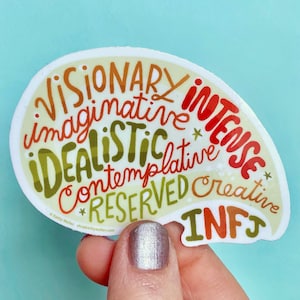 May include: A white sticker with a light green, orange, and red color scheme. The sticker is shaped like a brain and features the words "Visionary", "Imaginative", "Idealistic", "Intense", "Contemplative", "Reserved", "Creative", and "INFJ".