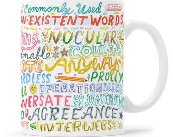 May include: White ceramic mug with a colorful design of words that are commonly used but don't exist, such as "prolly" and "anyways". The text "Commonly Used Non-Existent Words" is at the top of the mug.
