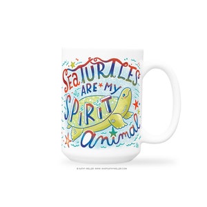 May include: White ceramic mug with a colorful illustration of a sea turtle and the text "Sea Turtles are my Spirit Animal".