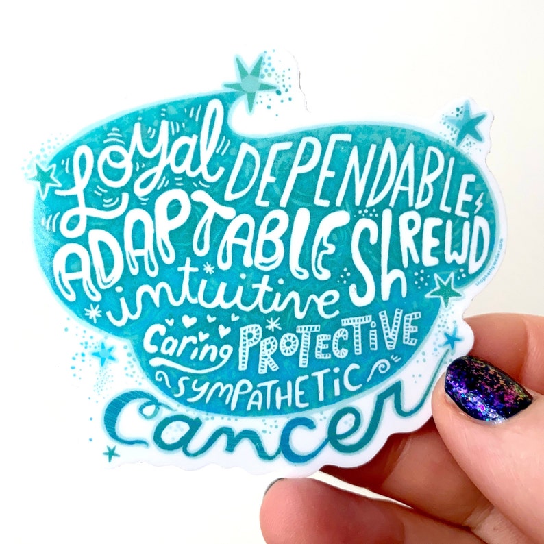 May include: A teal and white sticker with the word "Cancer" at the bottom. The sticker features the words "Loyal, Dependable, Adaptable, Shrewd, Intuitive, Caring, Protective, Sympathetic" in a whimsical font. Small stars and hearts decorate the design.