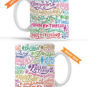 May include: White ceramic mug with colorful hand-drawn text related to embroidery, including the hashtags #embroidery, #needleart, #crossstitch, #floss, #hoopart, #frenchknot, #stitch, #needlepint, #feeling, #stitchvig, #embroideryartist, #floss, #embroideryguild, #needlework, #crossstitch. The text on the mug also includes the words "I love embroidery", "hand embroidery", "embroidery thread", "cross stitching", and "thread painting".