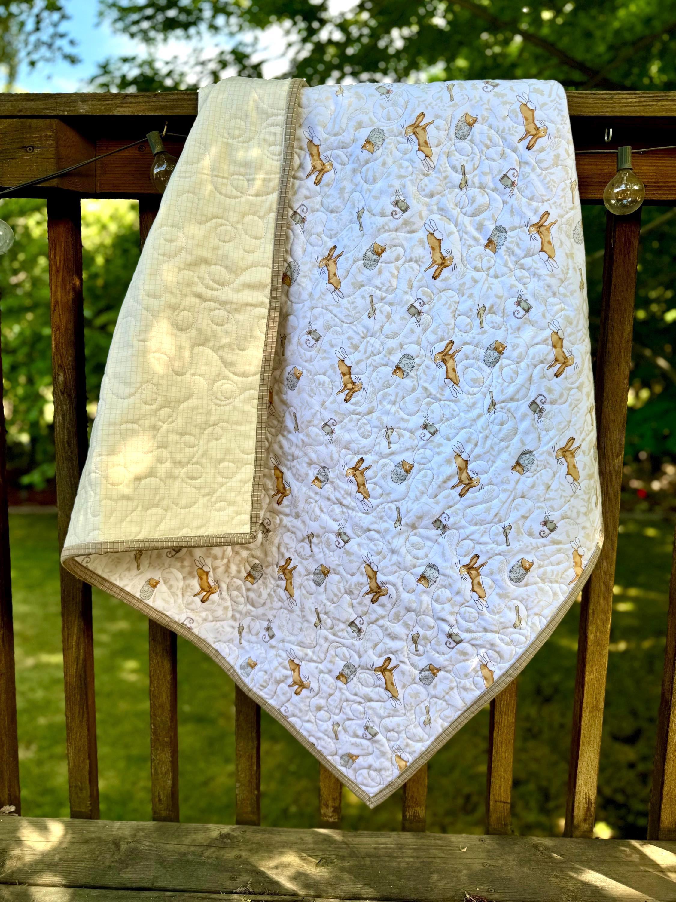 Guess How Much I Love You Forest Animals checked handmade white baby/toddler/child/lap quilt. Handmade, quilted, heirloom quality gift.