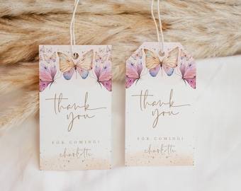 May include: Two white thank you tags with a gold glitter background and watercolor butterfly designs. The text reads "Thank you for coming! Charlotte".
