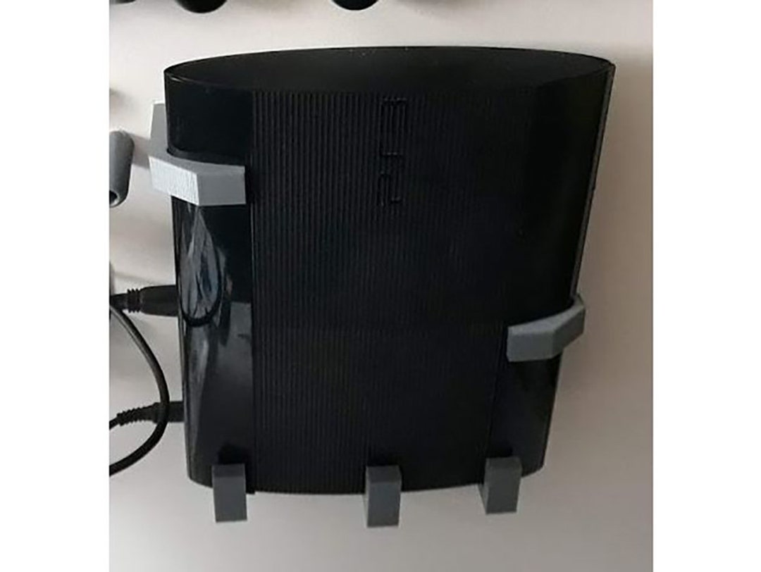 крепление playstation 3 на стену