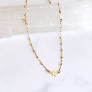Triple star necklace