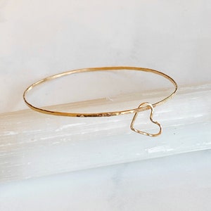 Floating heart bangle