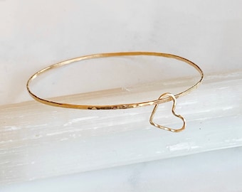 Floating heart bangle