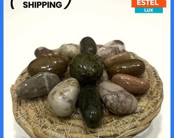 Set of decorative sea stones coated with epoxy resin in a wicker bowl Eco-friendly craft Natural sea stones for various crafts kitchen decor