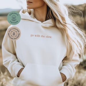 Statement hoodie BIO, hoodie with back print, mindful street fashion