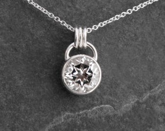 Clear Topaz Pendant: 8mm Faceted Gemstone, Sterling Silver