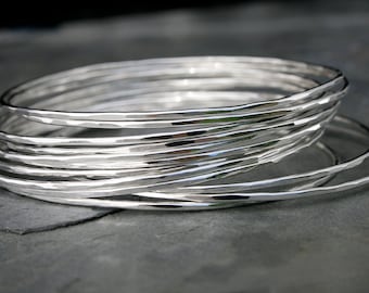 12 Skinny Sterling Silver Bangles, Set of Twelve Stacking Bracelets, Dozen Hammered Shiny Finish Bracelets