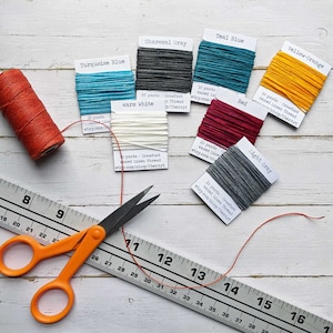 10 yards Crawford Waxed Linen Thread, 4 ply, Choose a color, showing thread wrapped on cards.