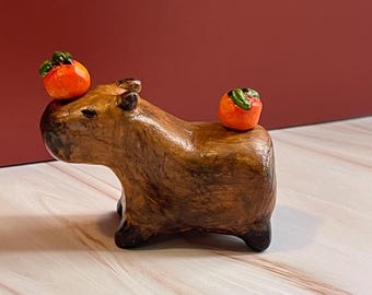 Capybara Miniature Sculpture: Handcrafted Clay Figurine with Magnetic Oranges