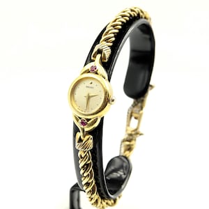 Relojes Seiko para mujer en tono dorado con 2 rubíes, reloj de cóctel de vestir Ref. 1E20-0430 - Vintage 1989